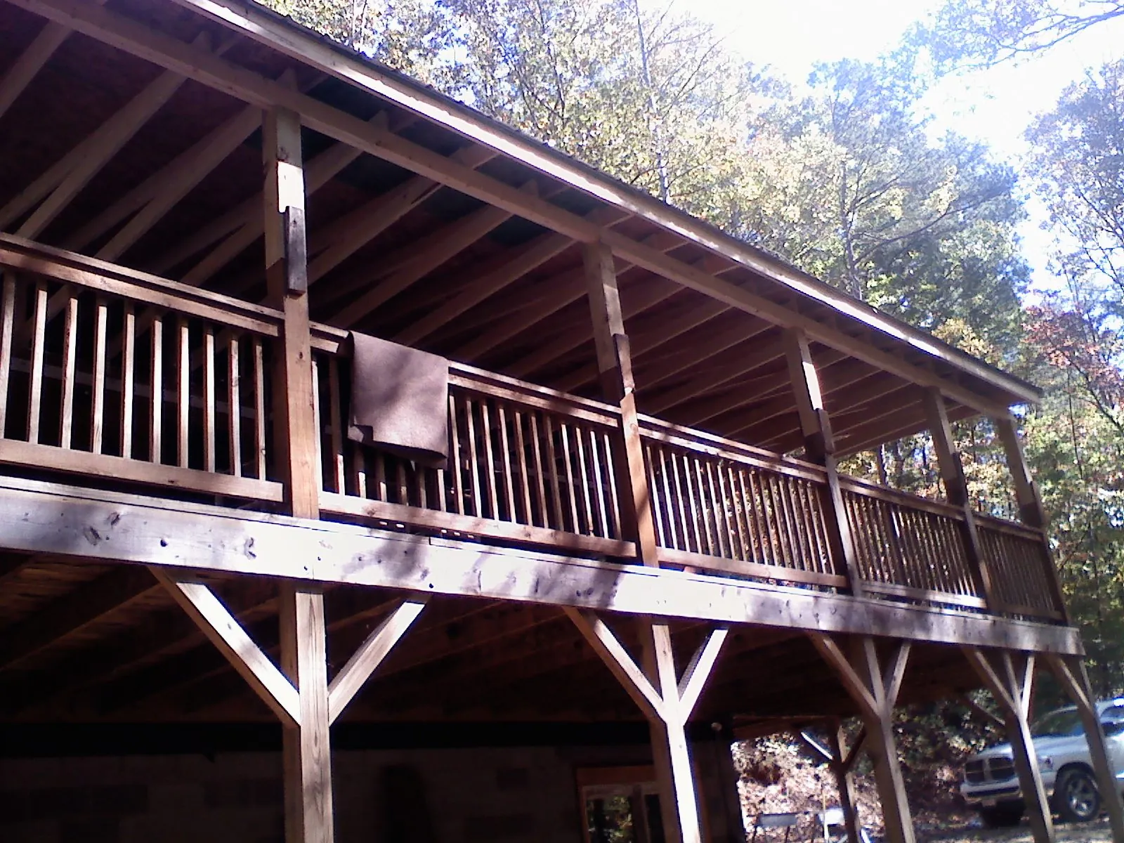Timber framing under a new elevated porch and deck — Roof Leak Repair in Berkey by Roofing Brothers